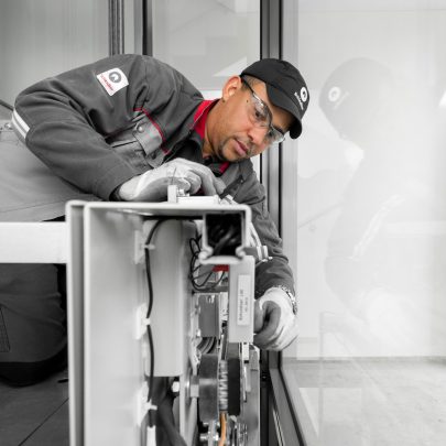 Schindler service technicians working on an elevator Schindler service technicians working on an elevator